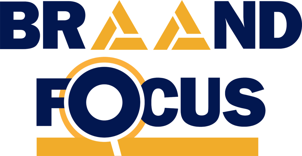 Logo of a brand with a magnifying glass focusing on it