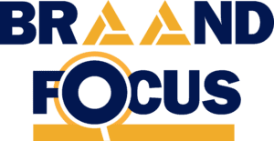 Logo of a brand with a magnifying glass focusing on it